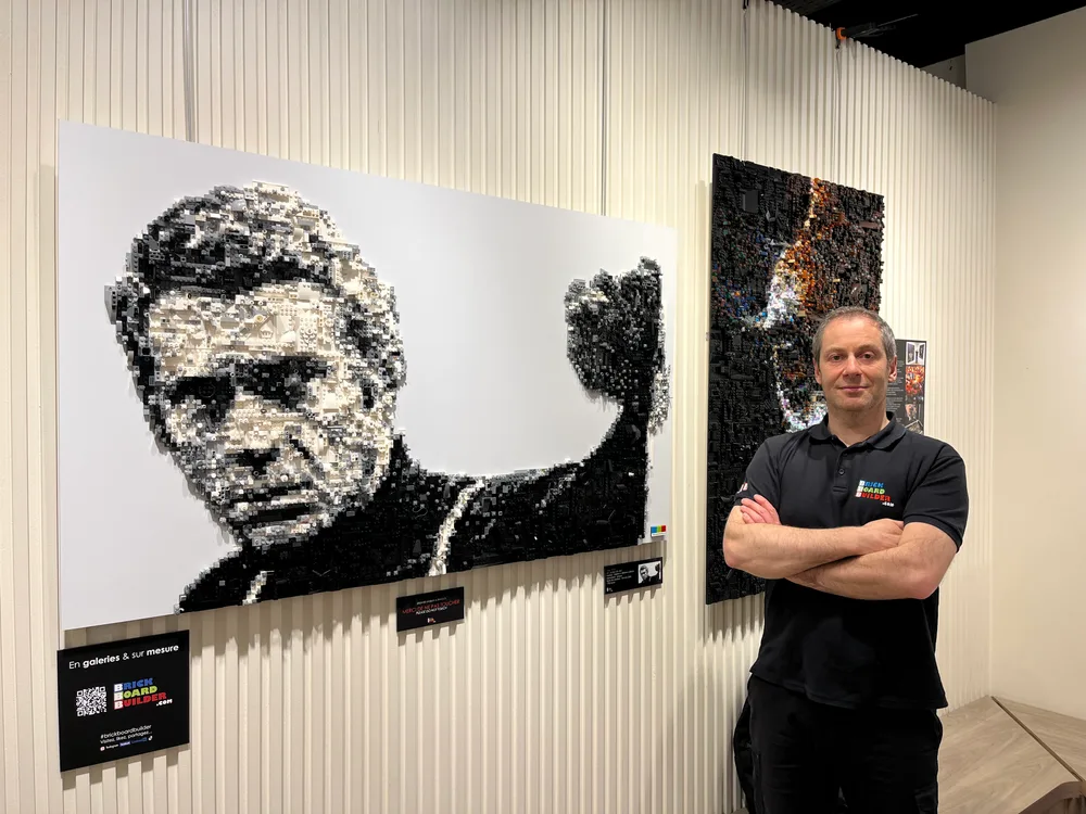 LEGO pixel artist Grégory posing with his creations