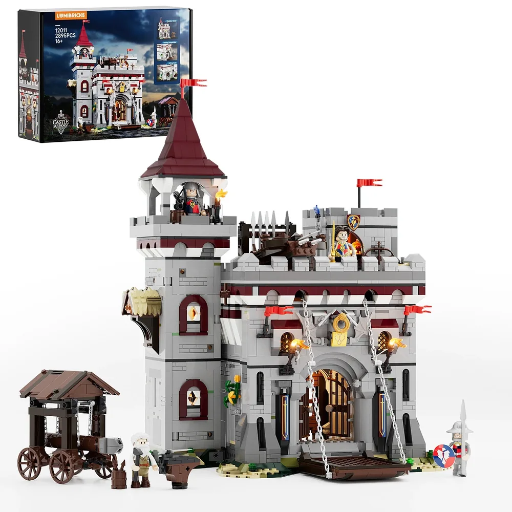 An overhead view of the assembled Lumibricks Castle Armory set 12011, featuring a central grey castle structure with a dark red conical tower roof, flags, and a drawbridge. To the left stands a separate dark brown siege engine on wheels. The product packaging is visible in the upper left corner, showing alternative angles and interior details of the castle.