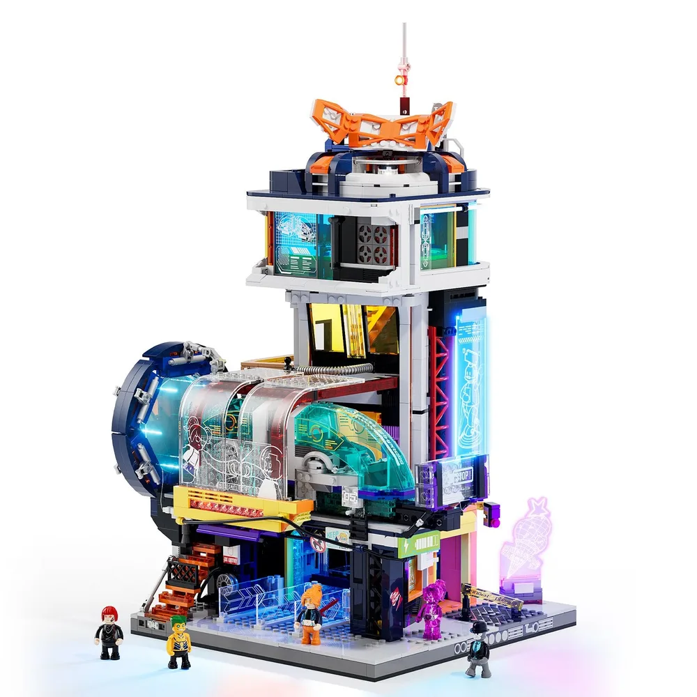 Lumibricks L9098 Cyberpunk Neoncity Floating Train Station build, featuring multi-level architecture with integrated light strips and light points illuminating trans-clear and colored elements, displayed with five minifigures.