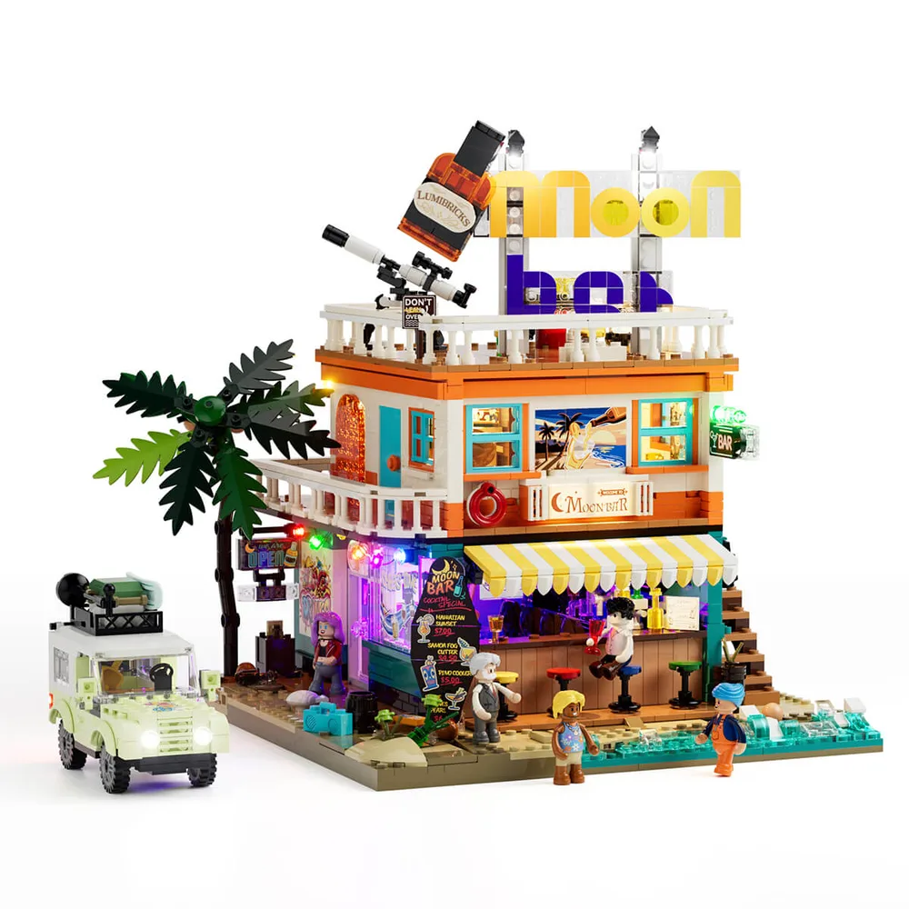 The Lumibricks Moon Bar set 18009 during construction in daylight, showing its multi-level structure and an unlit off-road vehicle on a beach base.