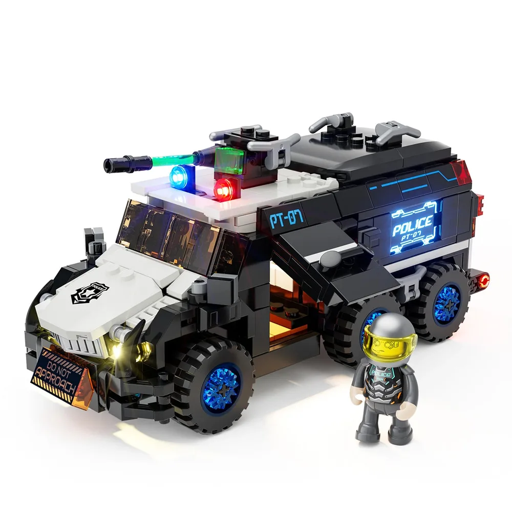 A heavily armored black and white police vehicle with six wheels and visible glowing lights, shown in a well-lit studio setting with a minifigure standing beside it. The vehicle has a prominent 'DO NOT APPROACH' sign on the front bumper.