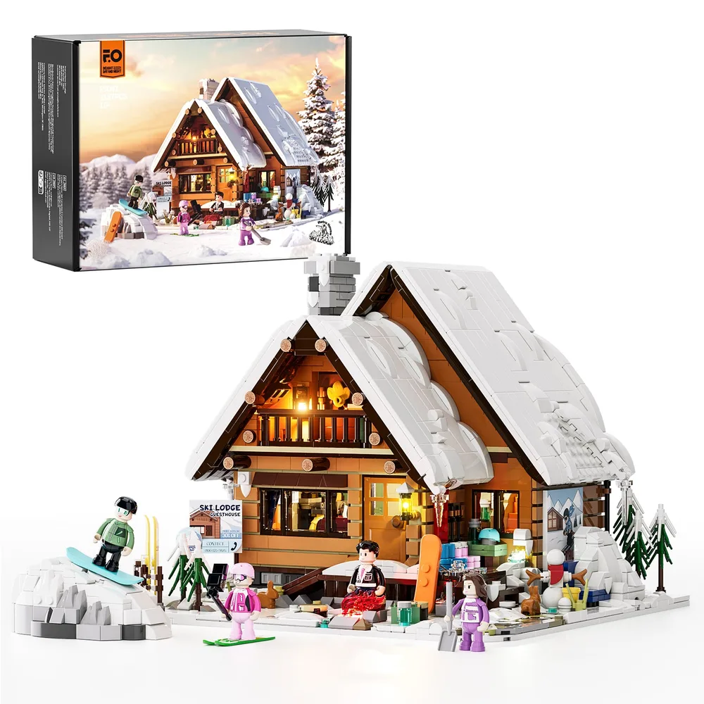 Lumibricks Ski Lodge F9041 with box, showing full model illuminated against a snowy background with minifigures snowboarding, skiing, and gathering around a fire pit.