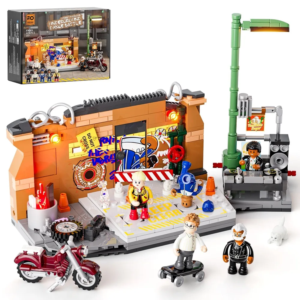 Overhead view of the Lumibricks F9069 "Underground Dance Battle" box showing the full set and components, next to the unlit assembled build featuring a brick wall with graffiti, a DJ booth, minifigures, a motorcycle, and various street elements on a grey baseplate.