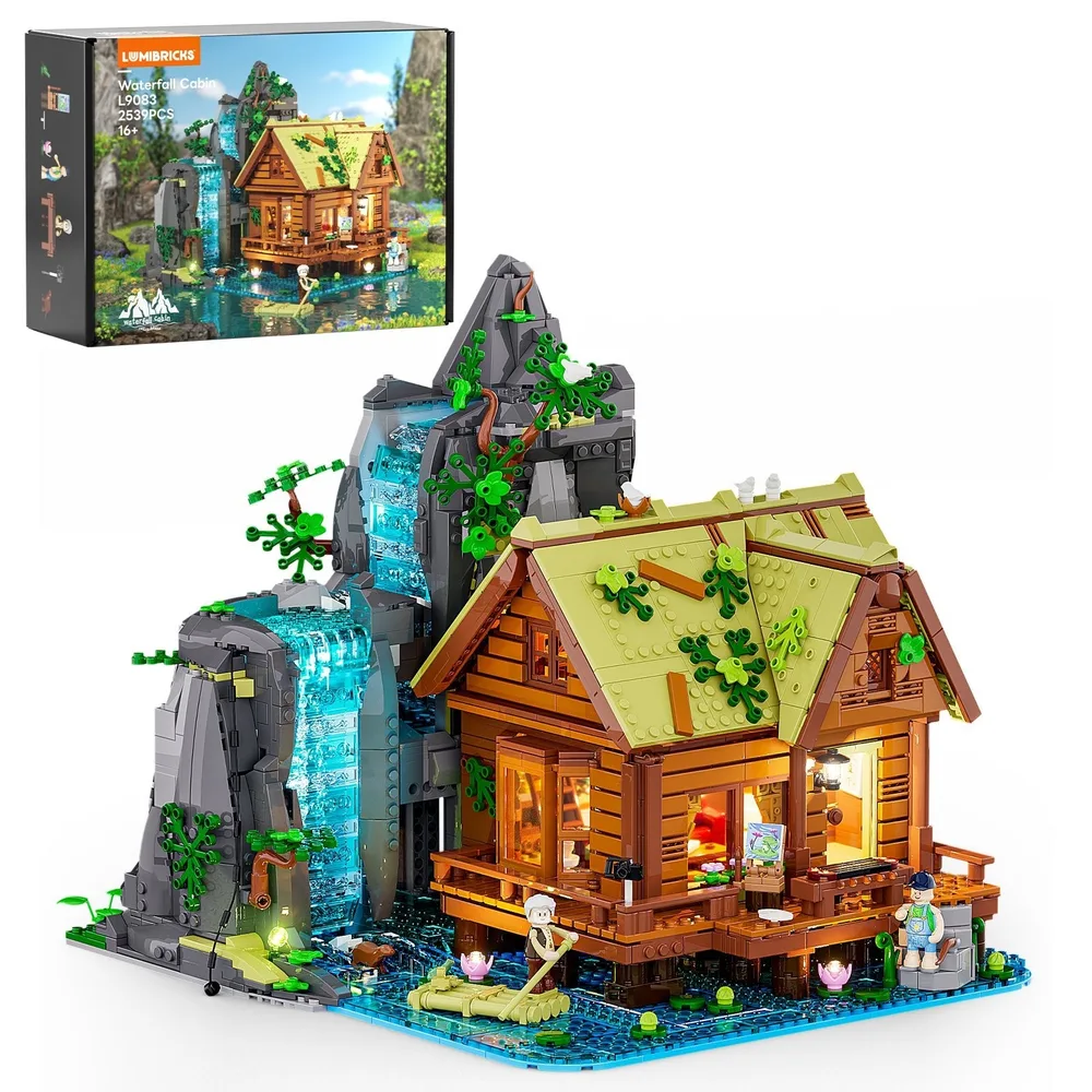 A fully assembled Lumibricks Waterfall Cabin L9083, showcasing its intricate design with a flowing waterfall, detailed cabin, and minifigures, presented next to its product box.