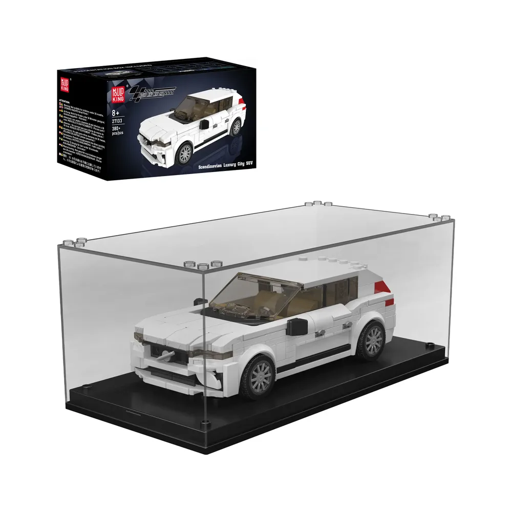 The Mould King XC60 SUV 27133 building block set, a white brick-built car, is displayed inside a clear acrylic case with a black base. The product box, featuring the same white SUV model, is visible in the background against a white studio backdrop.