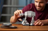 Hands with AT-AT model.