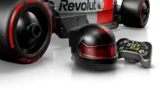 Close-up of LEGO F1 driver helmet and pit board