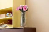 Roses in vase, home display.