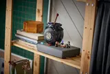Closed cauldron on a shelf.