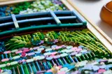 Close-up of LEGO bridge and foliage.