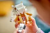 Child scans Cubone's smart tag.