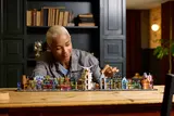 Person interacting with Diagon Alley model.