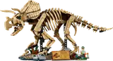 Assembled LEGO Triceratops skeleton with minifigure.