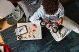 Person building LEGO Technic Ducati.