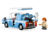Ford Anglia with open roof and trunk.