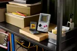 Game Boy displayed on a shelf.