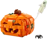 Assembled LEGO pumpkin, glowing ghost, and spider.