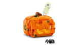 Lit LEGO pumpkin with hovering ghost.