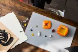 Pumpkin Lantern parts laid out on mat.