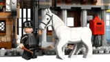 Minifigure, horse, and Owl Post.