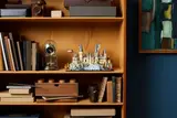 Lego Hogwarts Castle on a bookshelf
