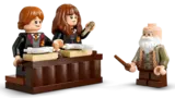 Close-up of Ron, Hermione, and Professor Flitwick minifigures.