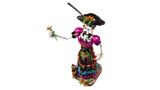 Angled view of La Catrina with flower.