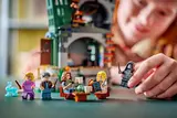 Child playing with minifigures.