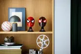 Miles Morales Mask on display with another mask.