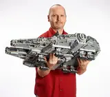 Designer with the massive Lego Millennium Falcon UCS 75192.