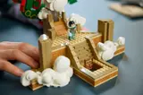 Minifigure on temple base.