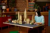 Person assembling model sections