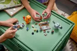 Children building the LEGO set.