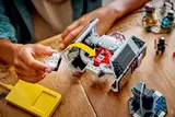 Inserting Smart Brick into TIE Fighter.