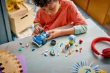 Child building the set.