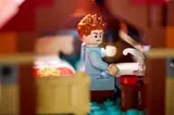Ron Weasley minifigure at desk in The Burrow.