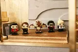 BrickHeadz display on wood.