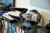 TIE Interceptor model on a shelf.