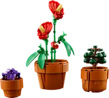 Close-up of three LEGO flowering plants.