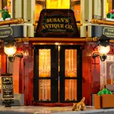 Illuminated entrance of Antique Co.