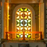 Illuminated stained-glass window.