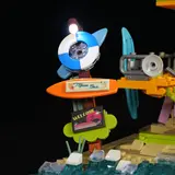 Illuminated signpost with surfboard and water.