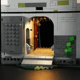 Side entrance with hidden power panel and ground lighting.