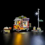 Illuminated street food scene.