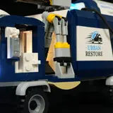 Truck's articulated side arm.