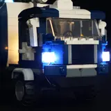 Truck's bright blue headlights.