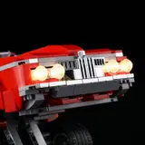 Low rider front grille, glowing headlights.