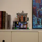 Lit studio model on a shelf.