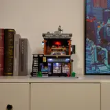 Shelf display with red light spill.