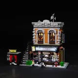 Nighttime view of illuminated Corner Photo Studio.